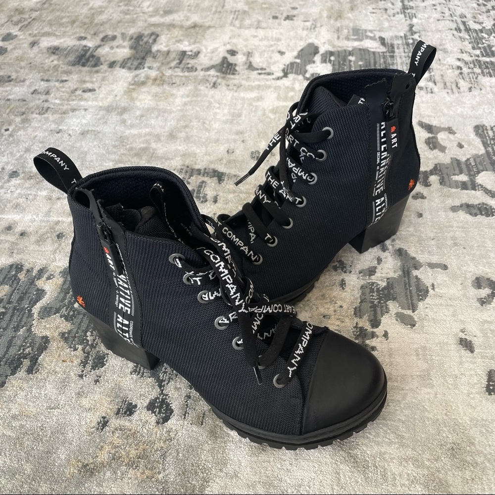 Stylish black, heeled combat boots